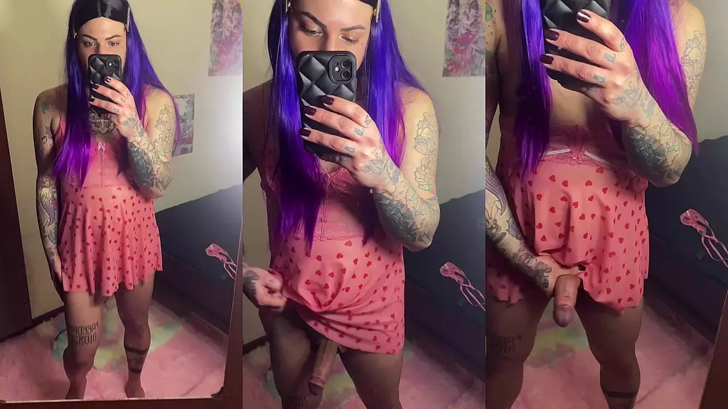trans girl shows off in the mirror with her big dick