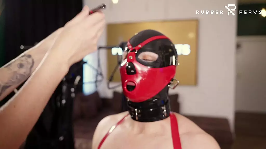 mistress dresses up her little rubber toy