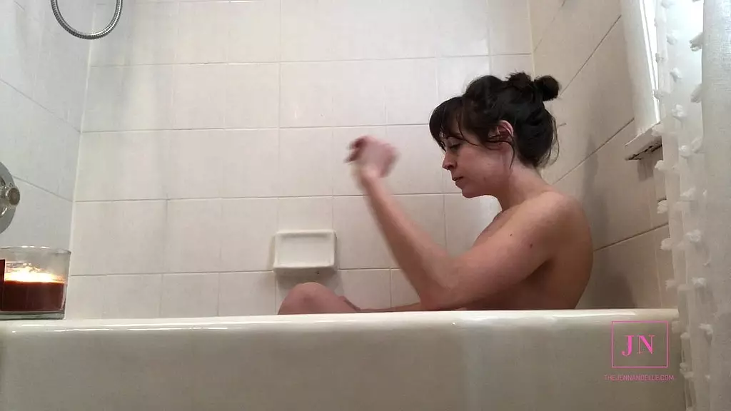 masturbating with my glass dildo bent over the bathtub