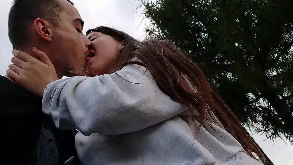 hot kissing with girlfriend in the park