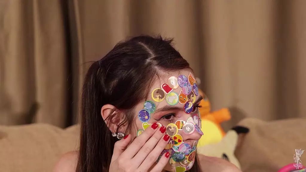 ziva fey - covering entire face with stickers