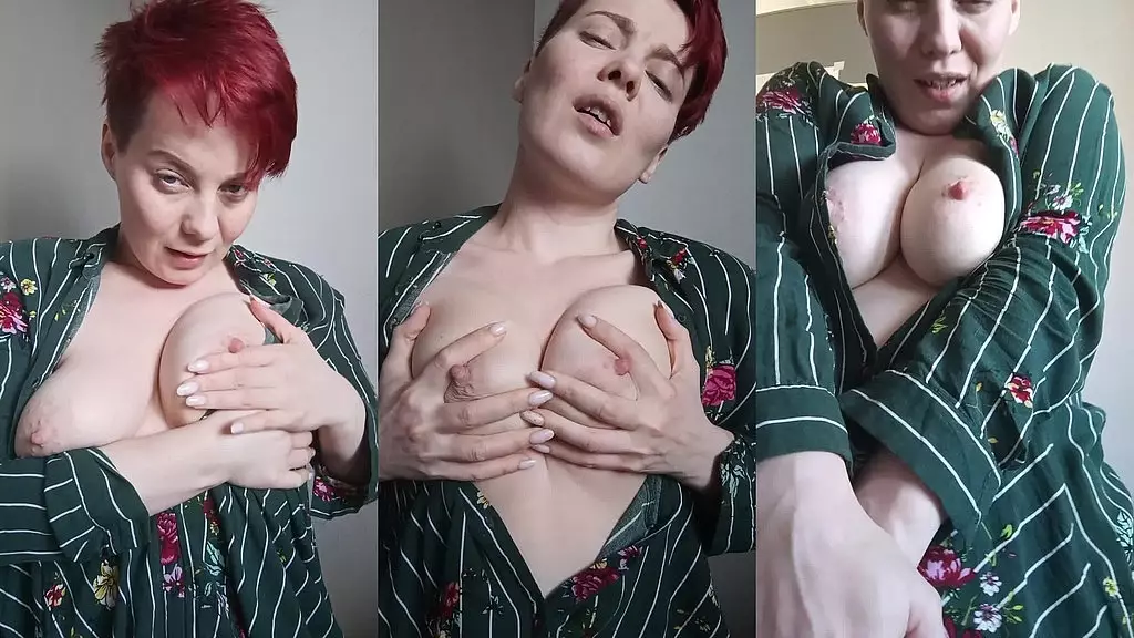 mature milf plays with her nipples and big tits