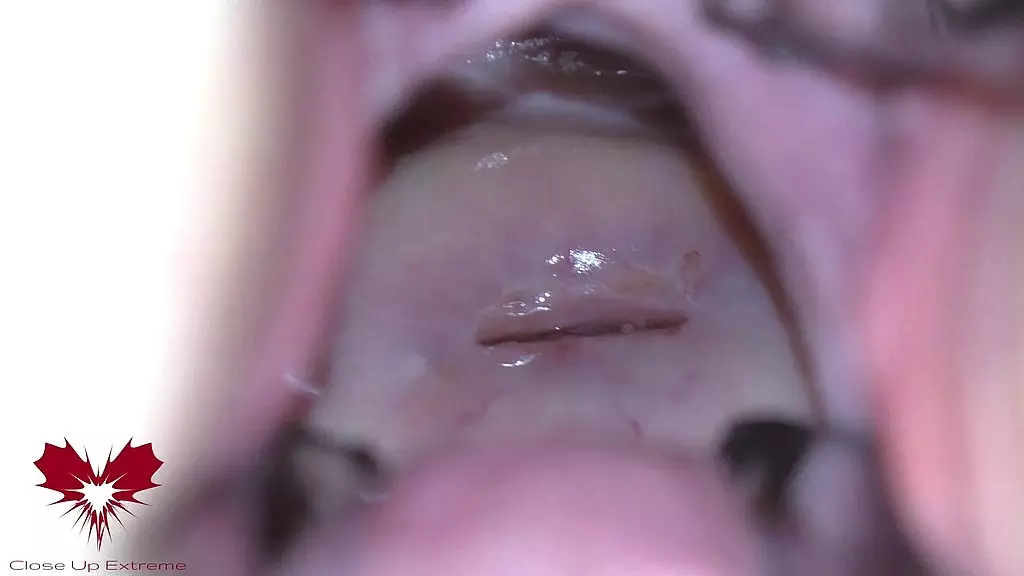 the mistress  cunt is opened with a hole expander so that you can study her cervix.