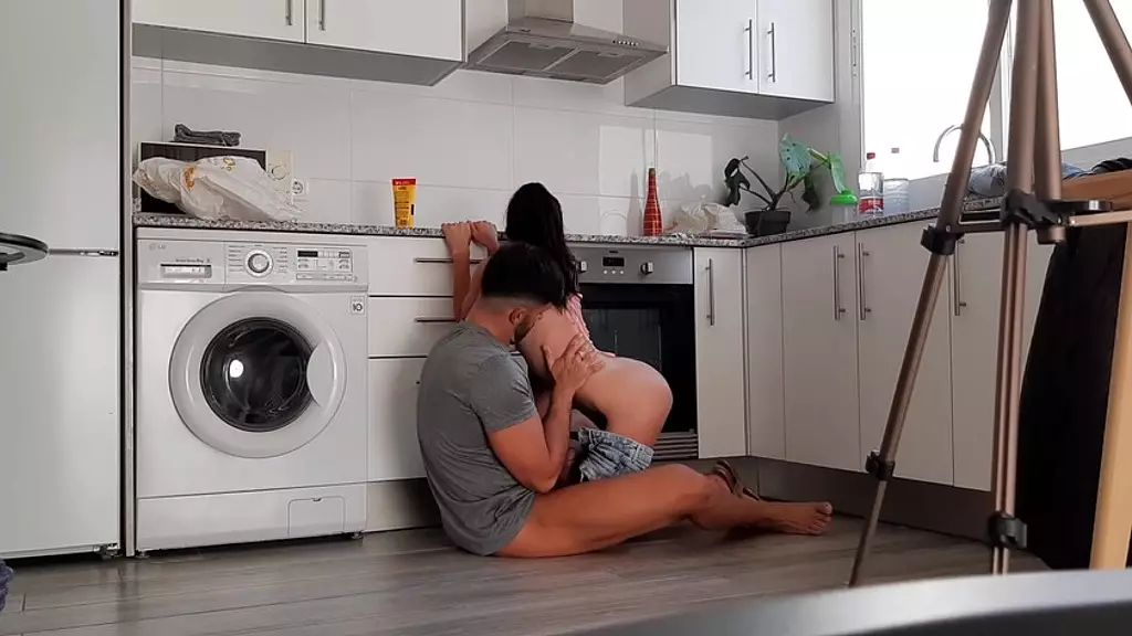 amateur couple having dirty sex on the kitchen