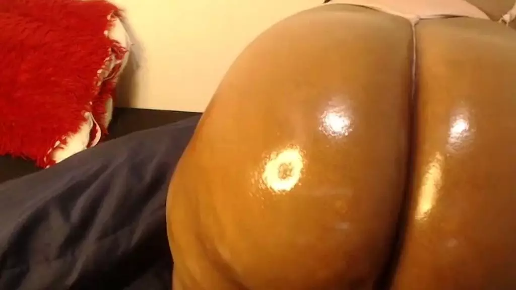 oiled booty bouncing
