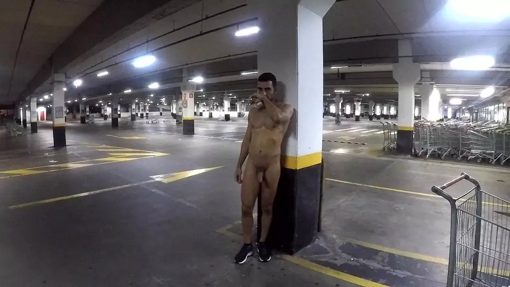 walking naked around a mall parking lot