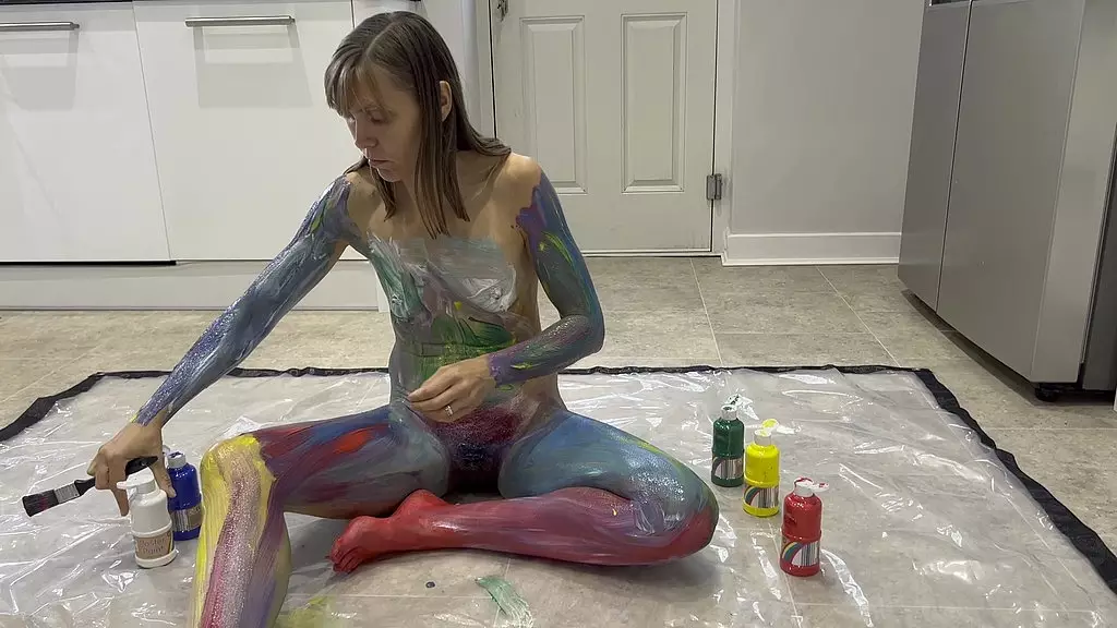 bursting with colour, i paint my whole nude body