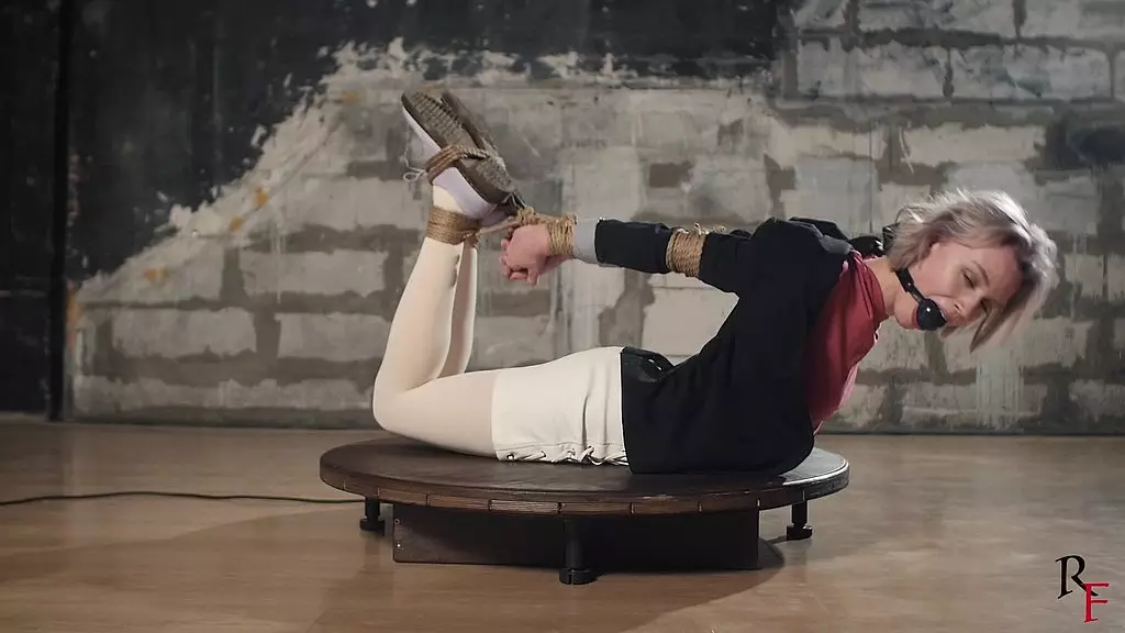 astrid shows her flexibility in hogtie