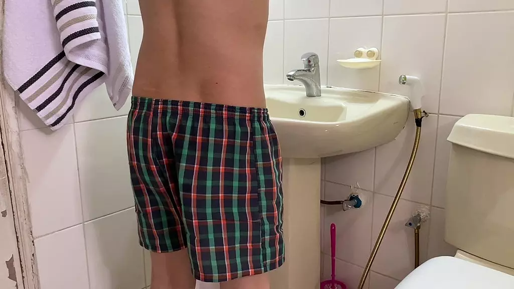 asian dude taking a hot shower before going to work