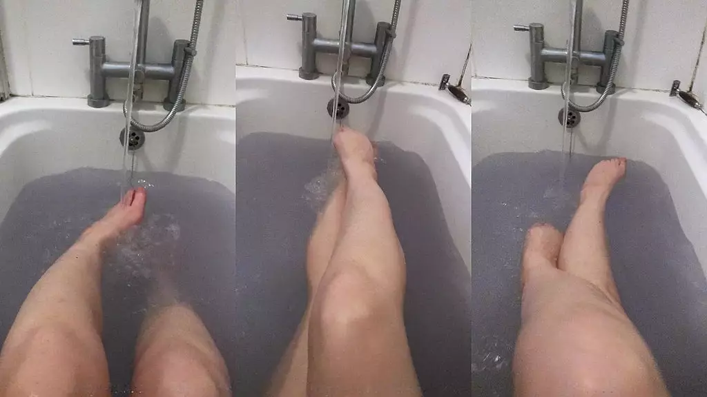 enjoying the feeling of the warm water rushing between my toes as i relax in the bath