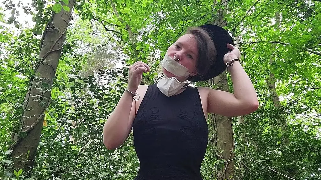 just a very well stuffed corseted slut playing with a vibrator in the woods....